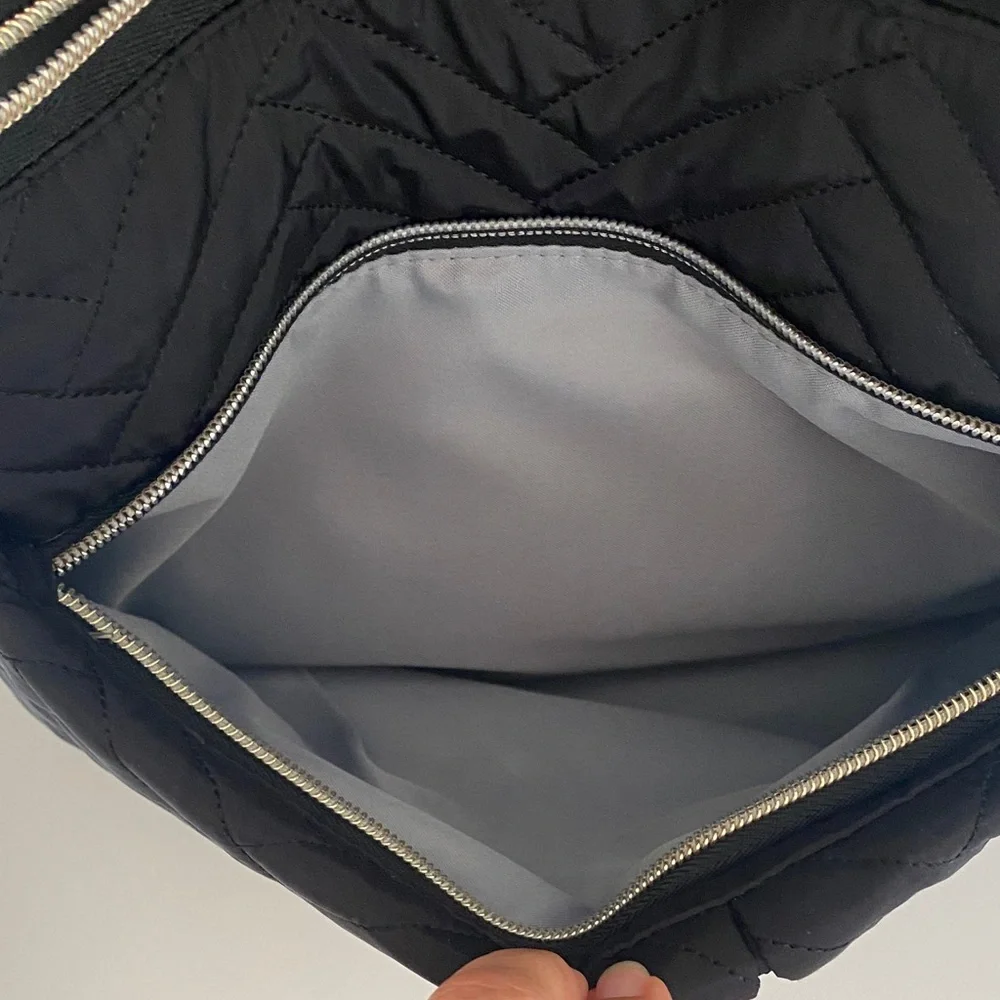 Skip Hop Black Quilted Multifunctional Backpack with Tan and gold accents